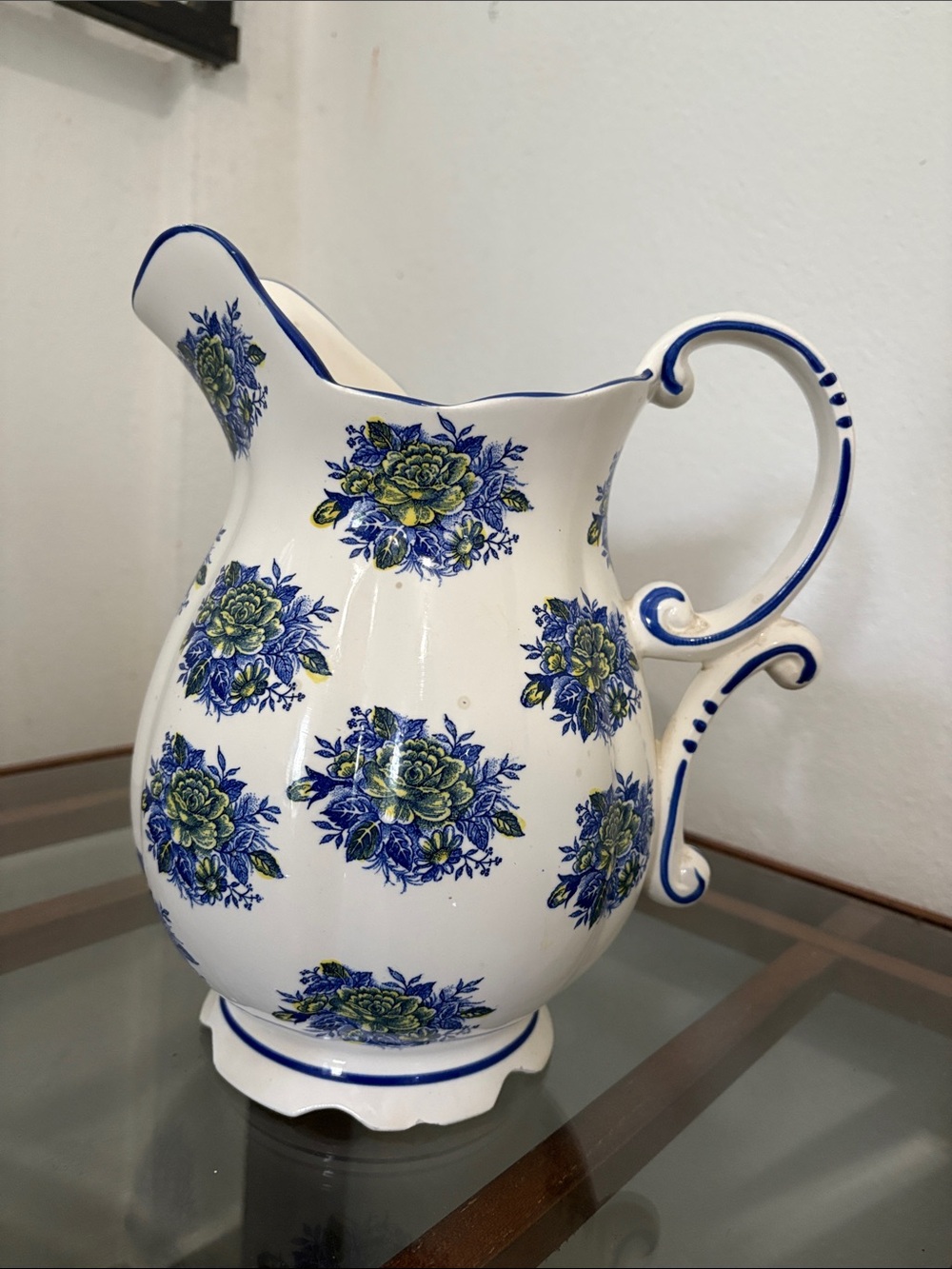 Classic White Ceramic Pitcher with Blue and Green Floral Pattern